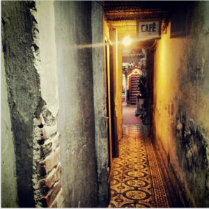 Go through this alley to enter the hidden gem, Cafe Pho Cu (Photo Credit: Steph Lawrence)